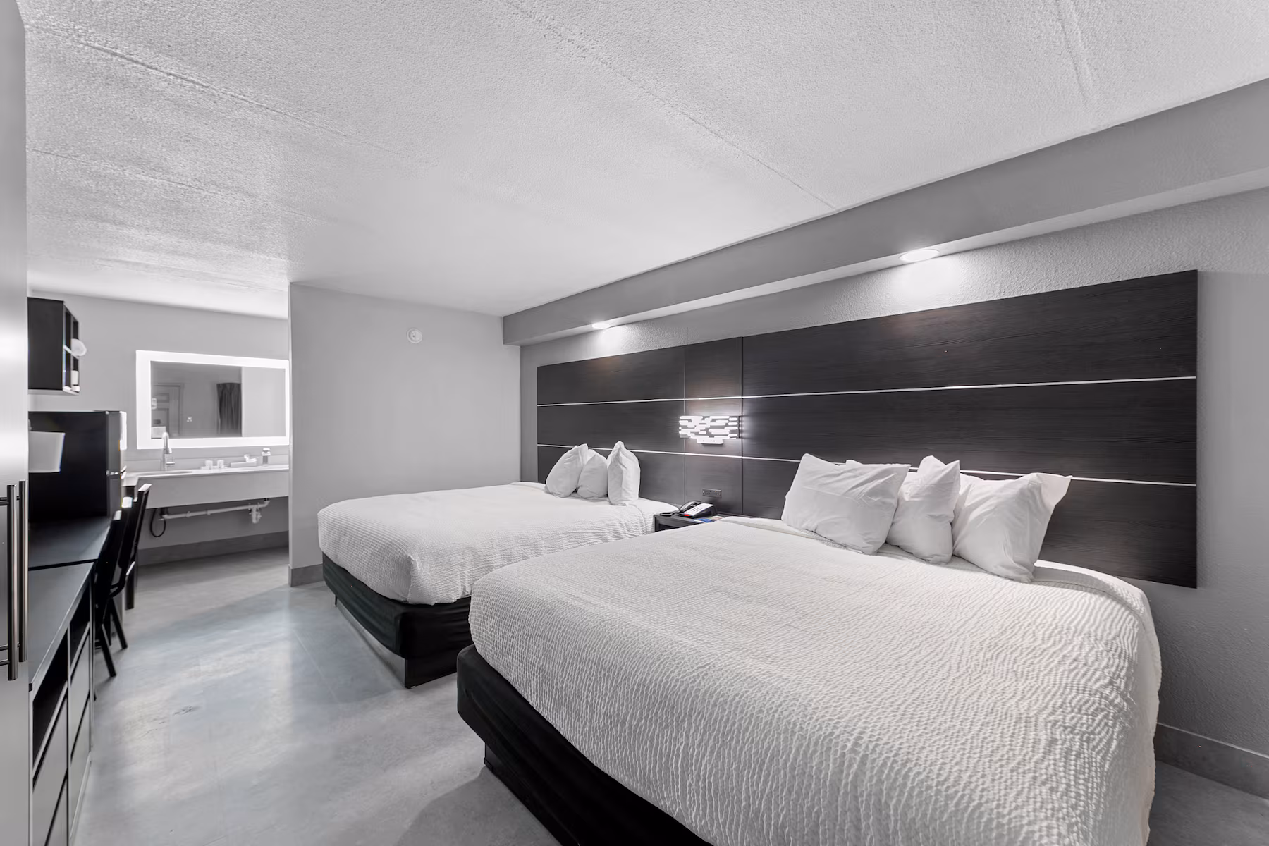Comfortable Hotel Rooms San Antonio TX featuring a spacious non-smoking suite with two king beds at Baymont by Wyndham San Antonio Downtown