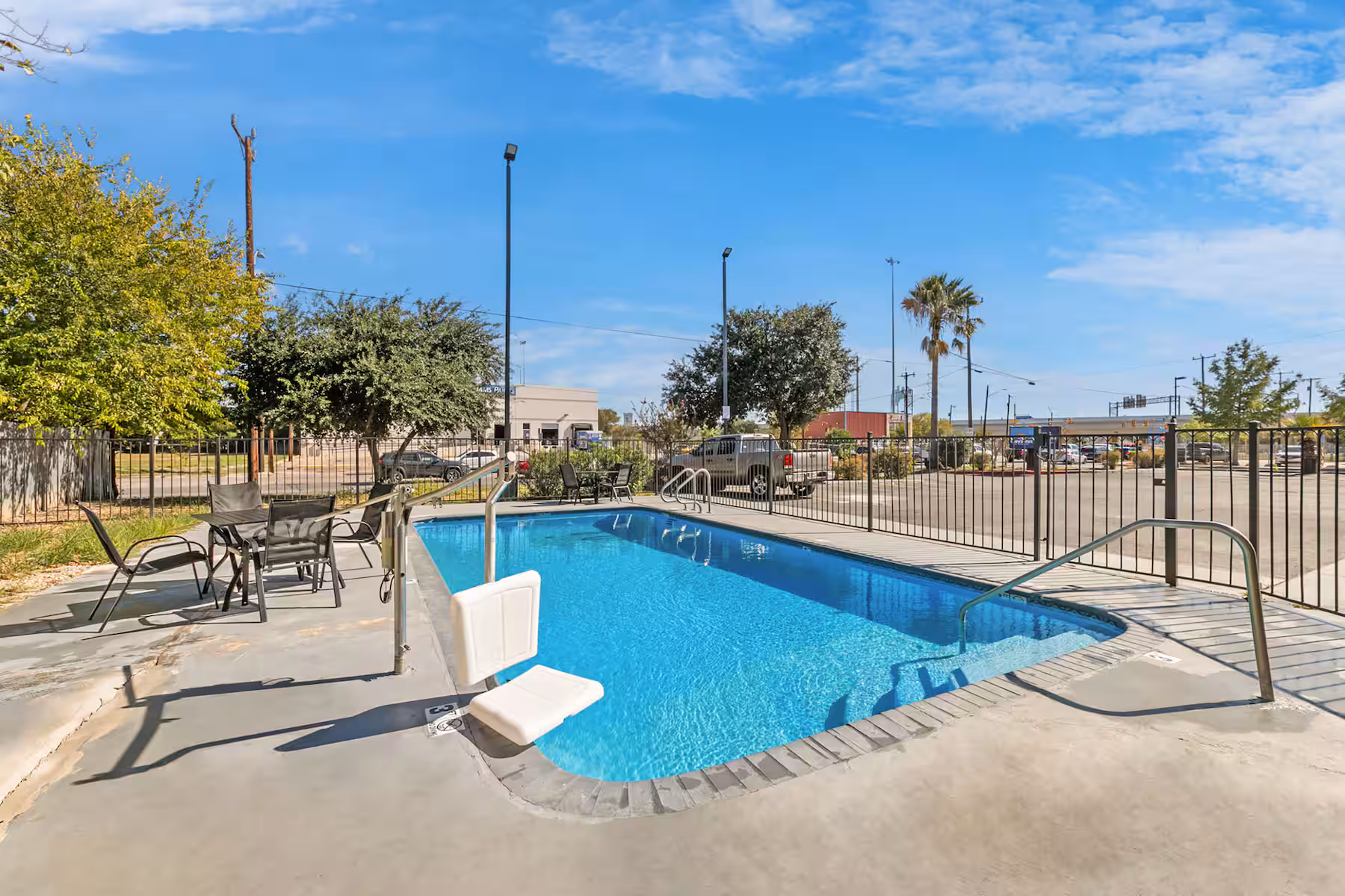 Business Hotel San Antonio TX featuring a clean outdoor pool area and comfortable guest amenities