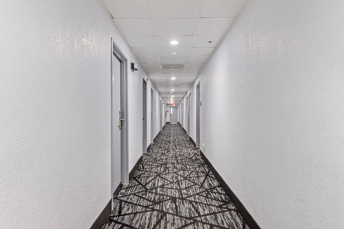 San Antonio Hotel Deals showcasing a clean and well-maintained hotel hallway at Baymont by Wyndham San Antonio Downtown